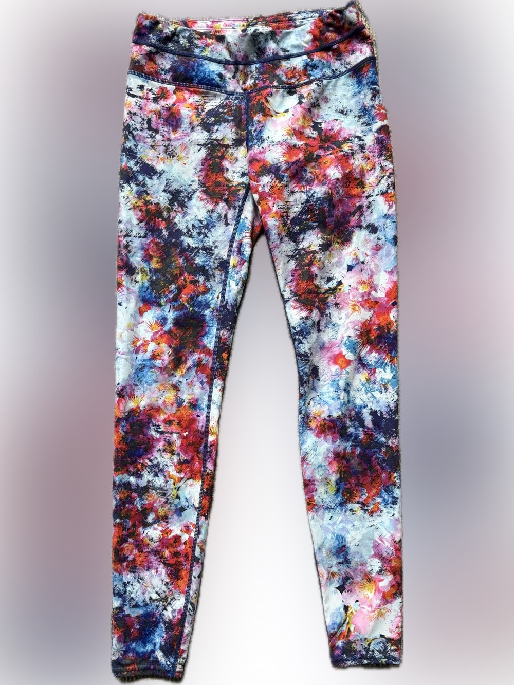 Athleta' Multicolor Floral Splash Leggings - Blue, Pink, Orange.